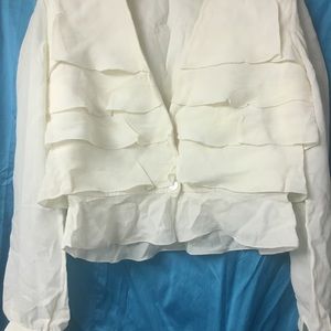 “Rare” 65% Silk “Valentino” ruffled blouse